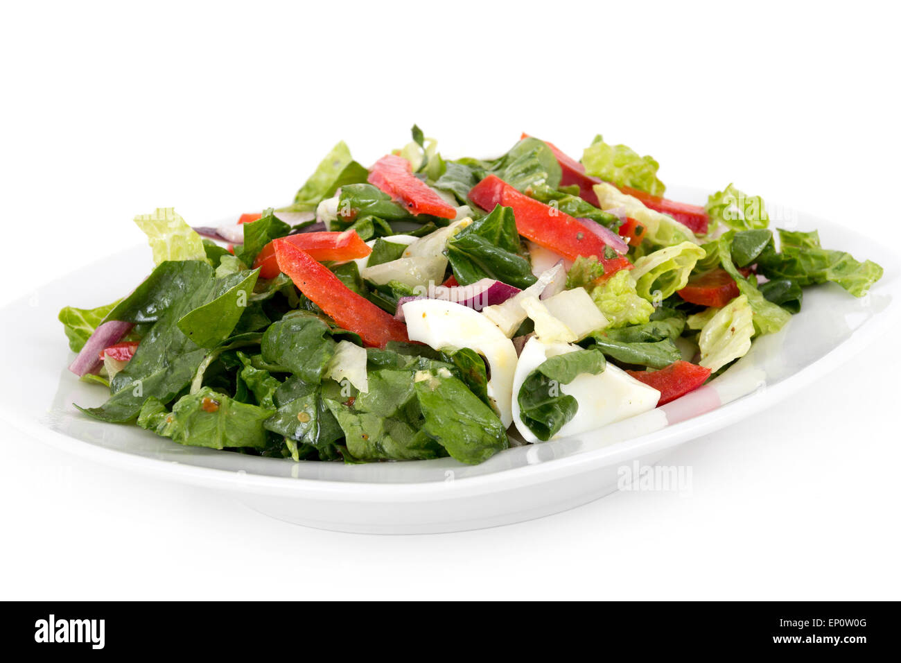 Egg and vegetables healthy organic salad over white background Stock Photo