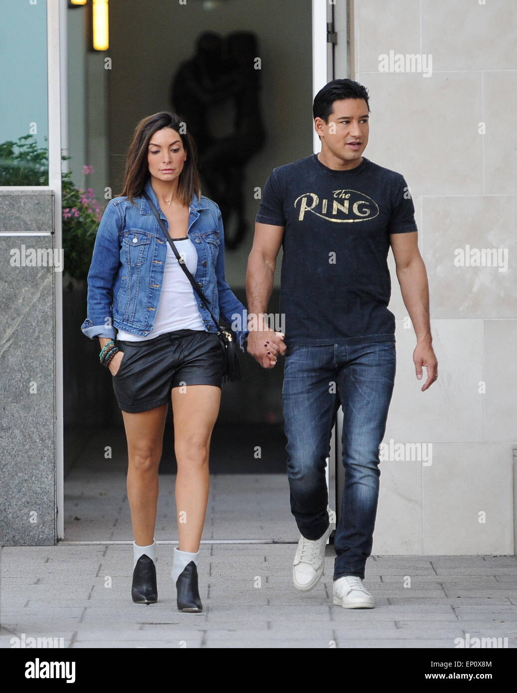 Mario Lopez spotted out holding hands with his wife Courtney Mazza  Featuring: Mario Lopez,Courtney Mazza Where: Beverly Hills, California, United States When: 07 Nov 2014 Credit: Cousart/JFXimages/WENN.com Stock Photo
