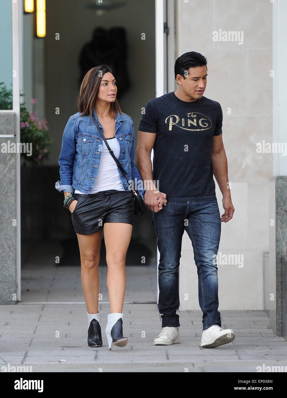 Mario Lopez spotted out holding hands with his wife Courtney Mazza  Featuring: Mario Lopez,Courtney Mazza Where: Beverly Hills, California, United States When: 07 Nov 2014 Credit: Cousart/JFXimages/WENN.com Stock Photo