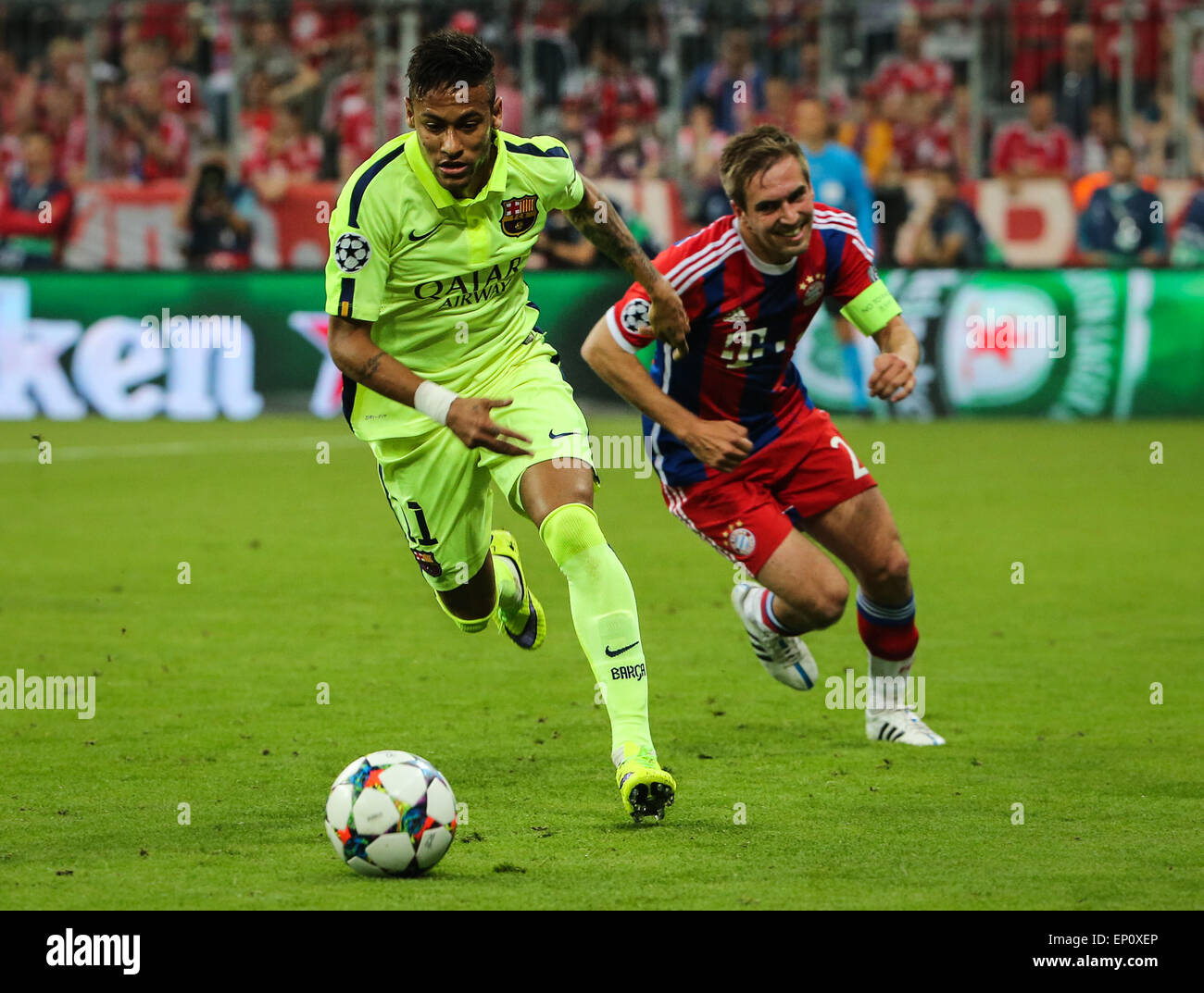 Munich, Germany. 12th May, 2015. Barcelona's Neymar (L) breaks through  during the UEFA Champions League semi-final second leg match between  Barcelona and Bayern Munich, in Munich, Germany, on May 12, 2015. Bayern