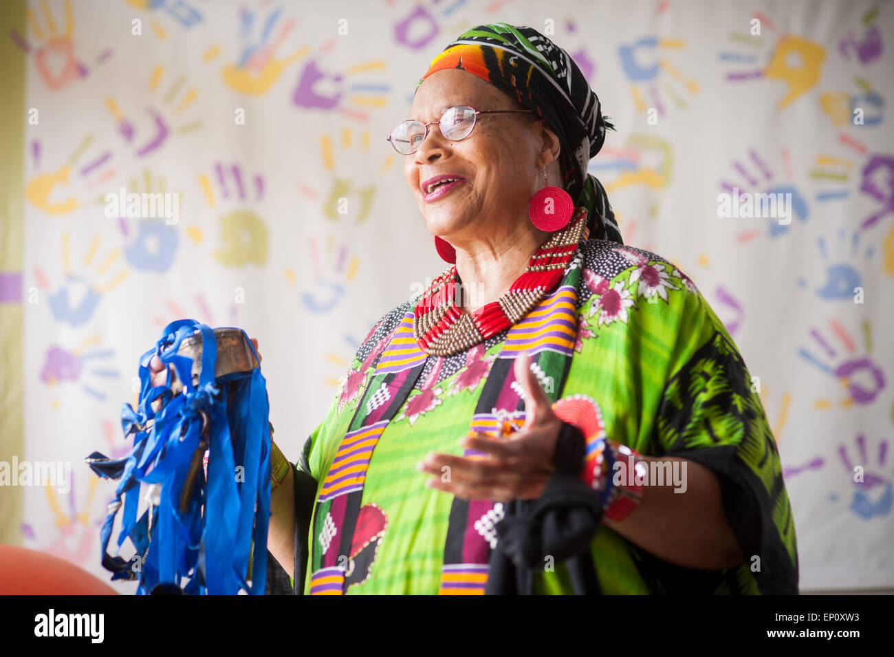 African American woman wearing colorful traditional clothes in Baltimore, Maryland Stock Photo