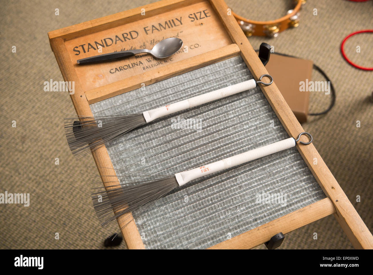 homemade musical instrument using wire brushes in Baltimore, Maryland Stock Photo