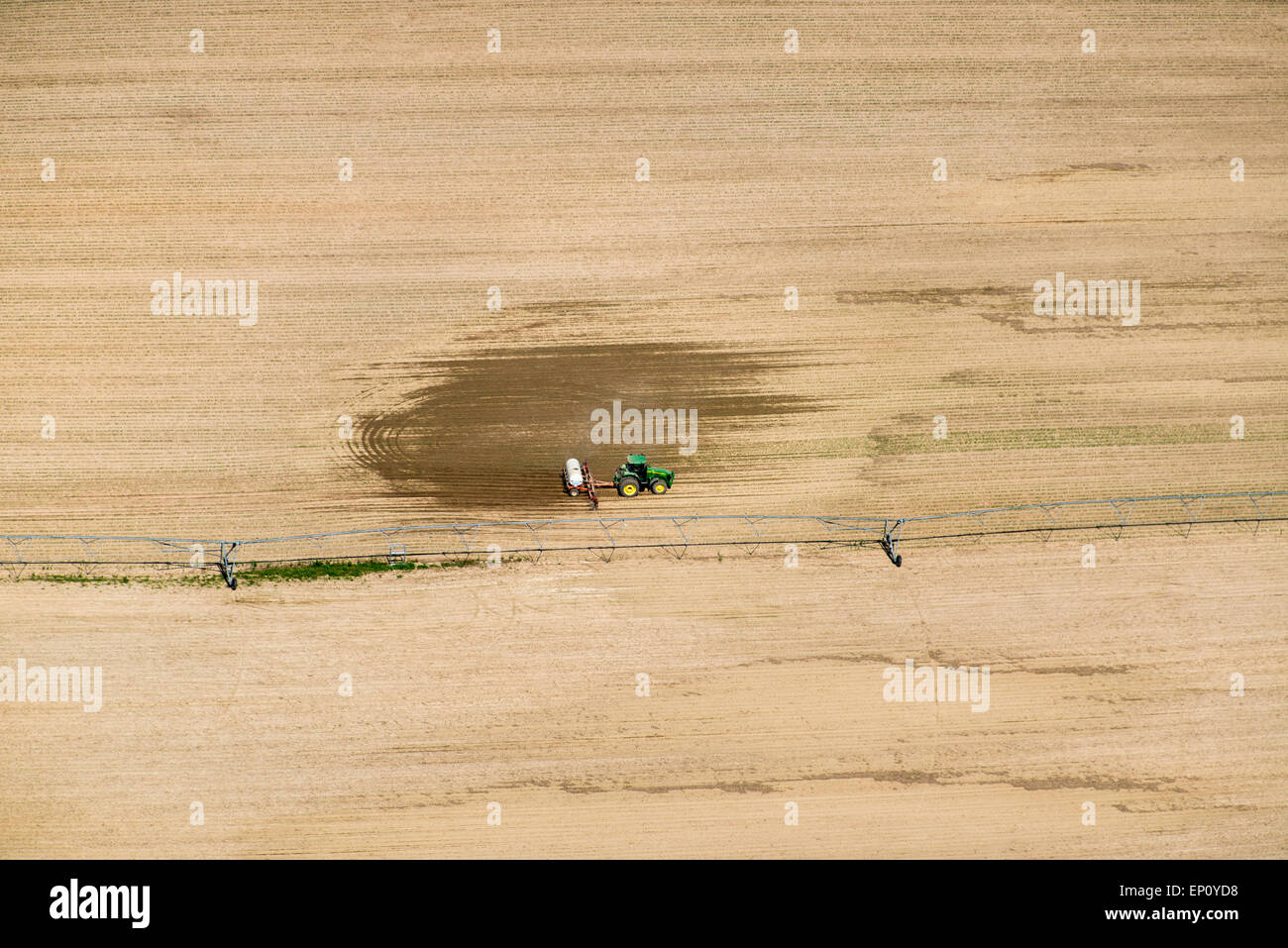 Aerial of spray application in agricultural field on the eastern shore of Maryland, USA Stock Photo