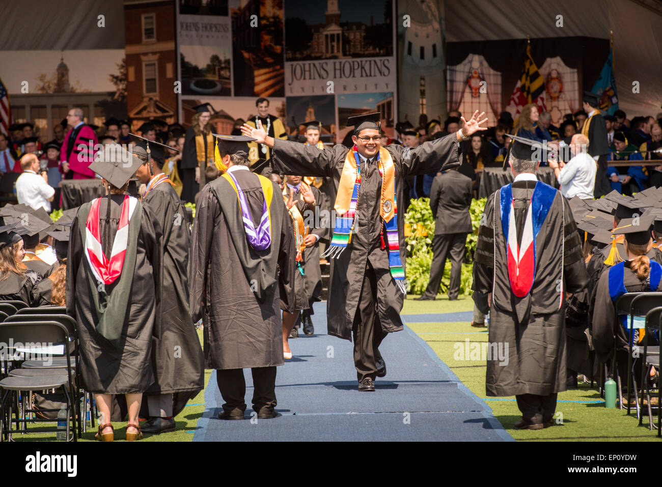 Excited graduate at graduation ceremony in Baltimore, Maryland, USA