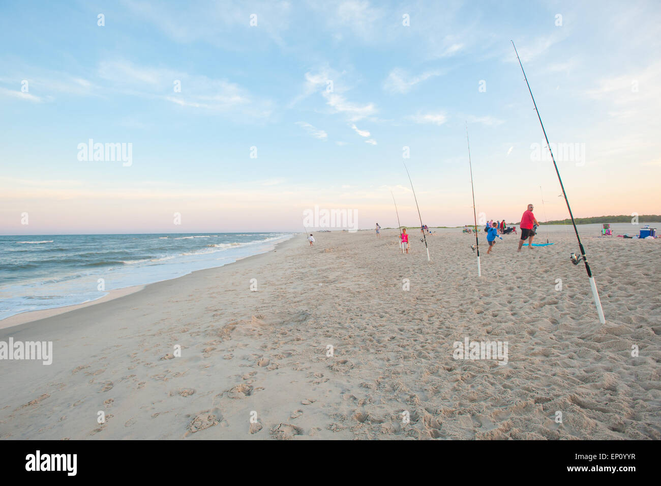 Families fishing at Assateague Island National Seashore, Maryland, USA Stock Photo