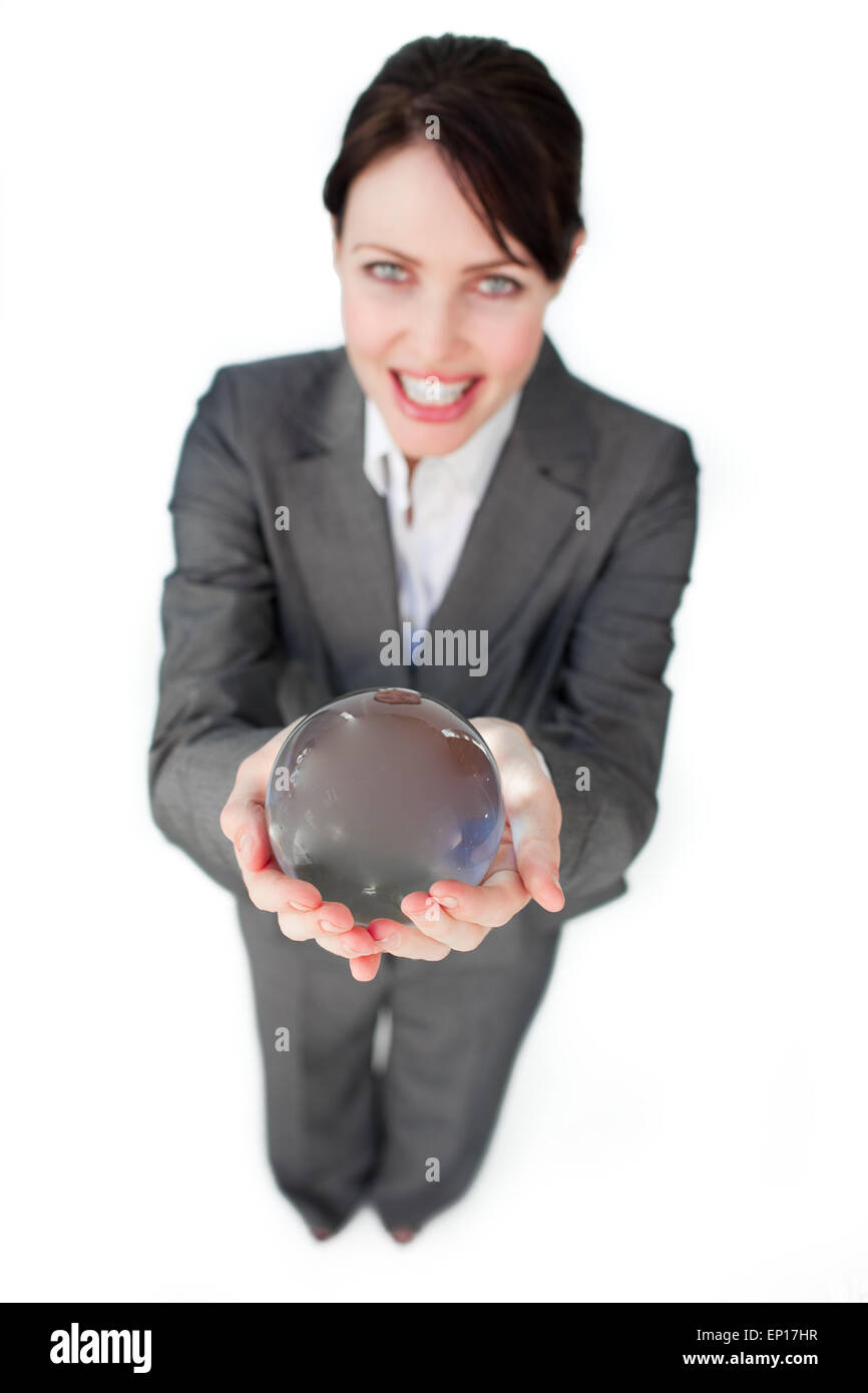 Smiling businesswoman holding a crystal ball Stock Photo - Alamy