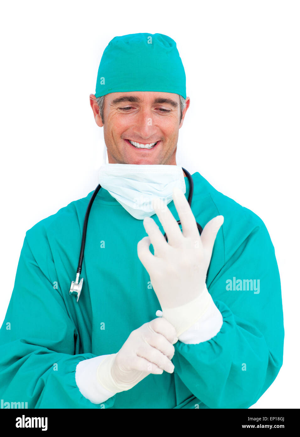 Attractive surgeon wearing surgical gloves Stock Photo Alamy