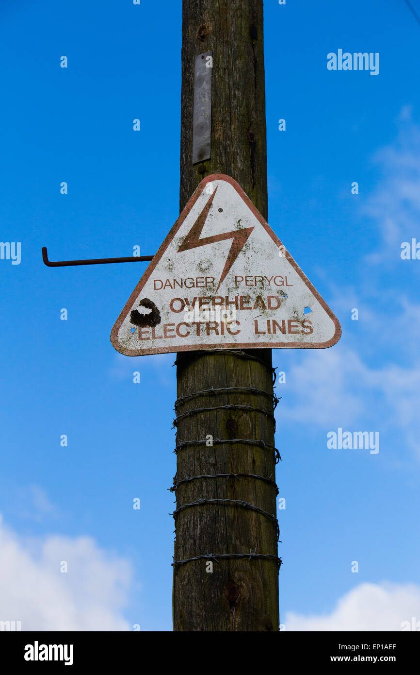 Danger Overhead Electric Lines Sign Stock Photo Alamy