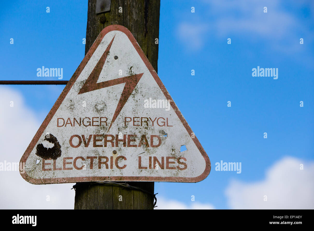 Danger Overhead Electric Lines sign Stock Photo Alamy