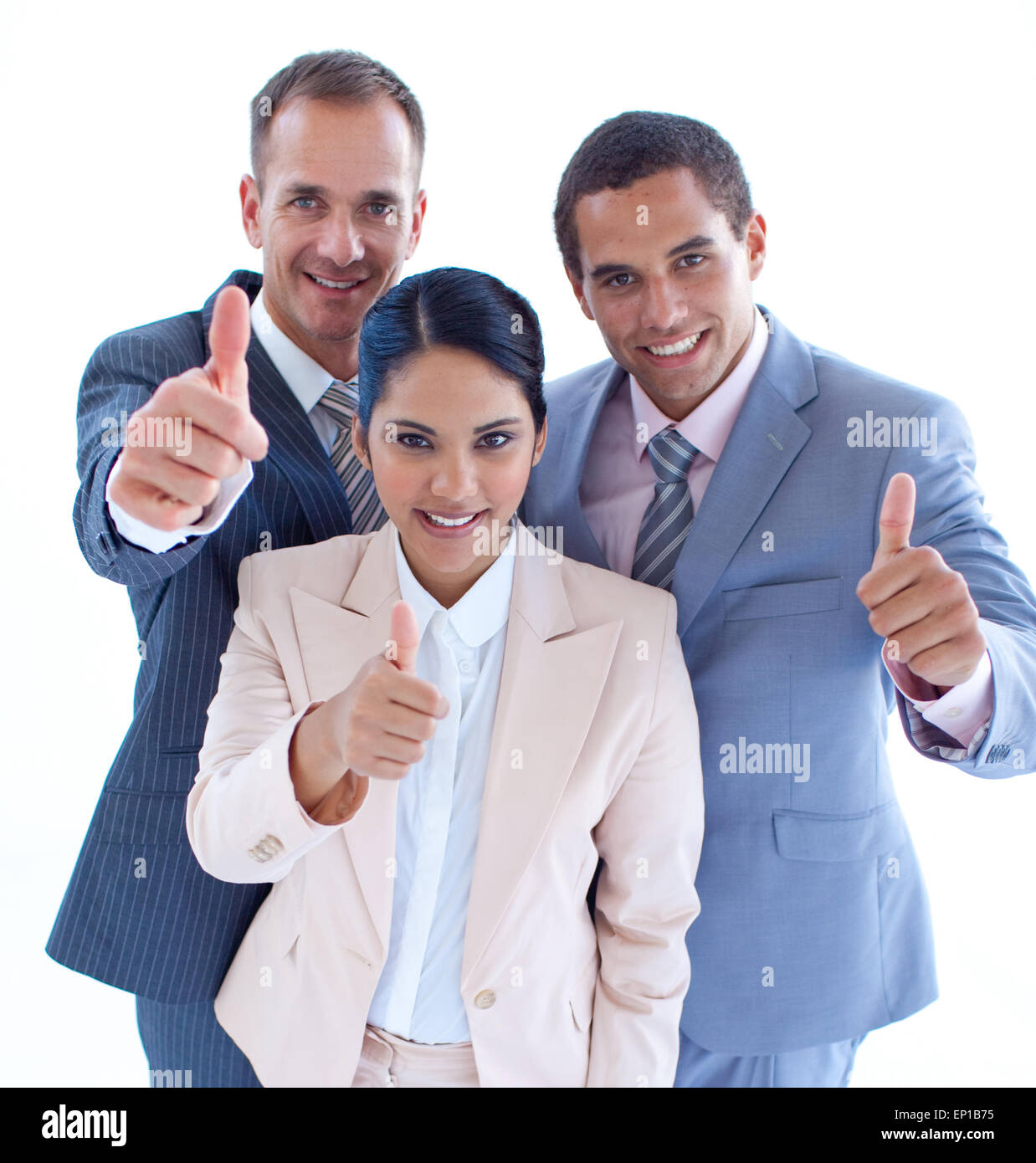 Smiling business team with thumbs up Stock Photo - Alamy