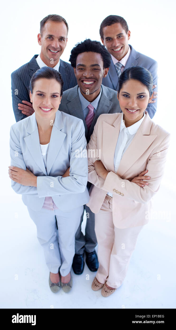 Happy international business team smiling at the camera Stock Photo - Alamy