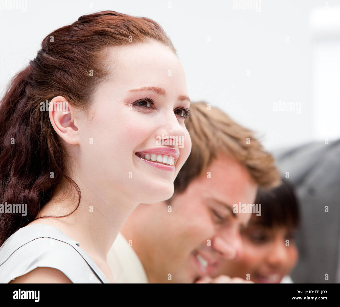 Portrait of a smiling businesswoman working Stock Photo - Alamy