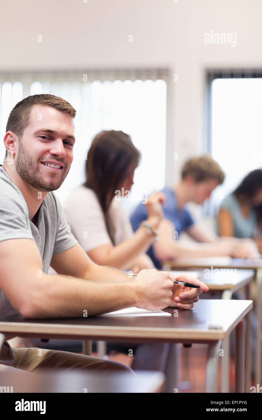 Portrait of a smiling young man Stock Photo - Alamy