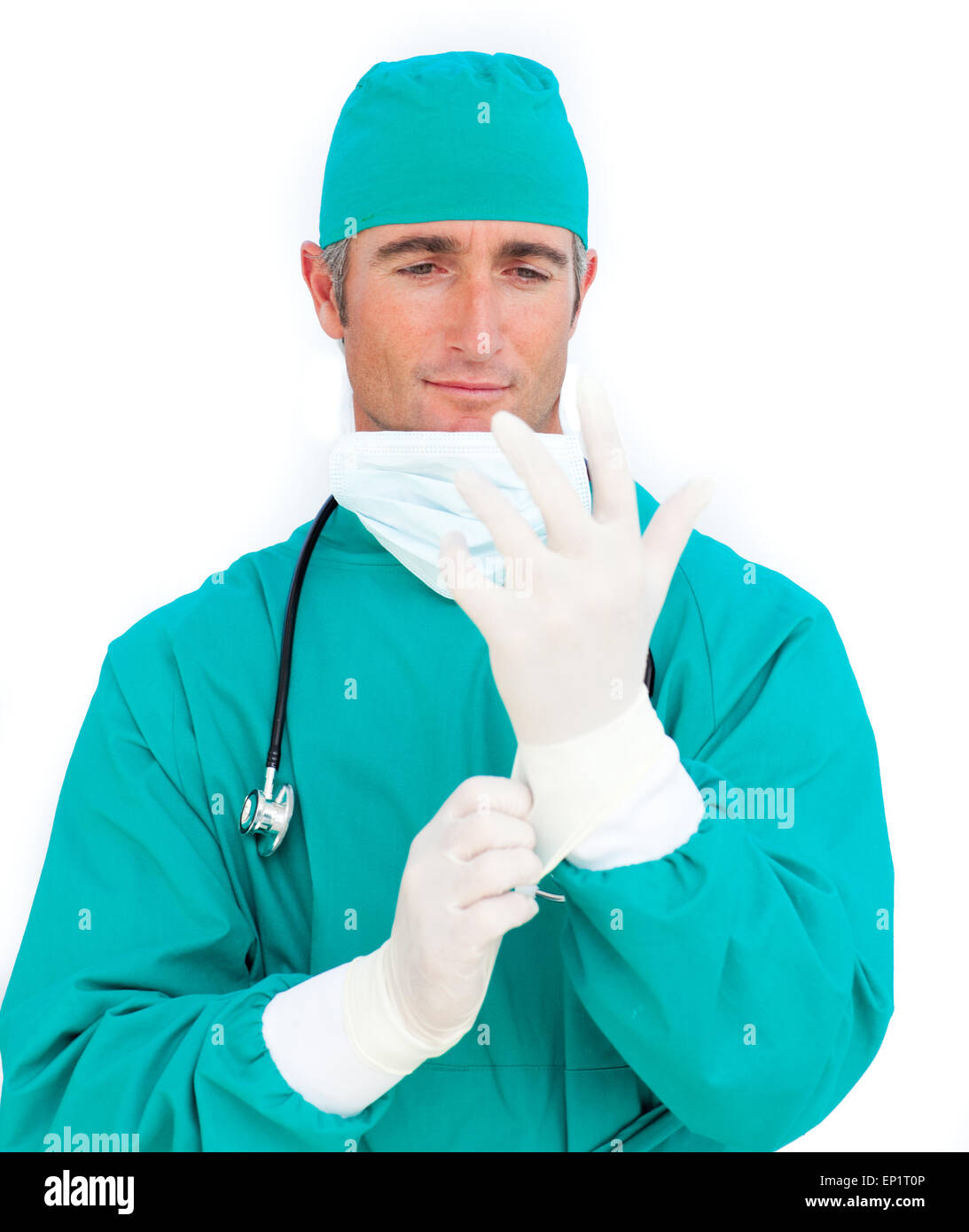 Charming surgeon wearing surgical gloves Stock Photo Alamy