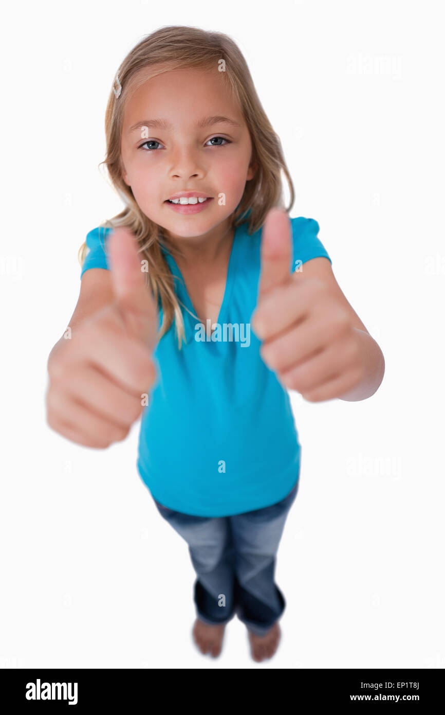Portrait of a young girl with the thumbs up Stock Photo - Alamy