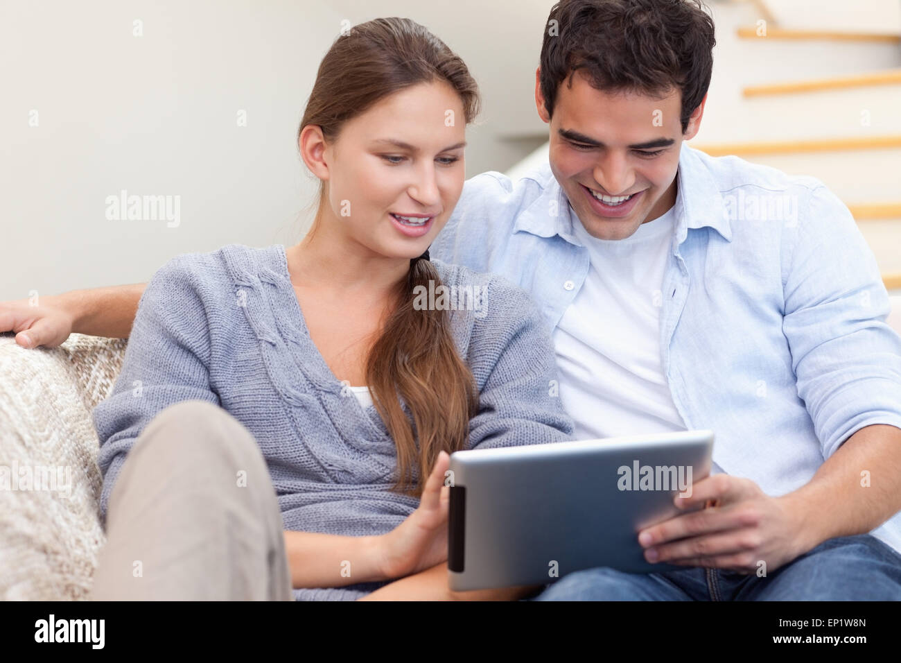 Couple using a tablet computer Stock Photo