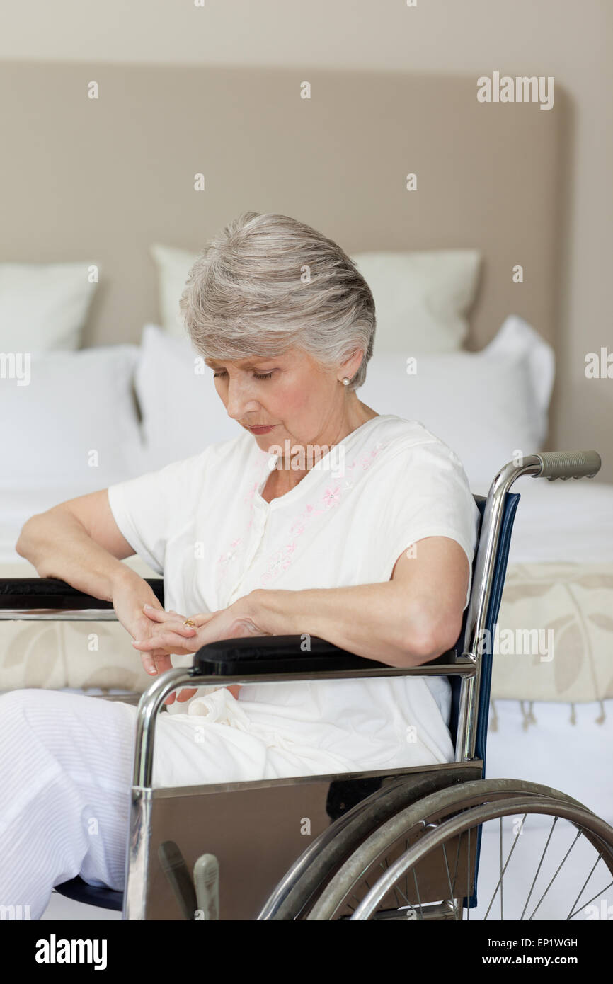 Senior woman asleep in her wheelchair at home Stock Photo Alamy
