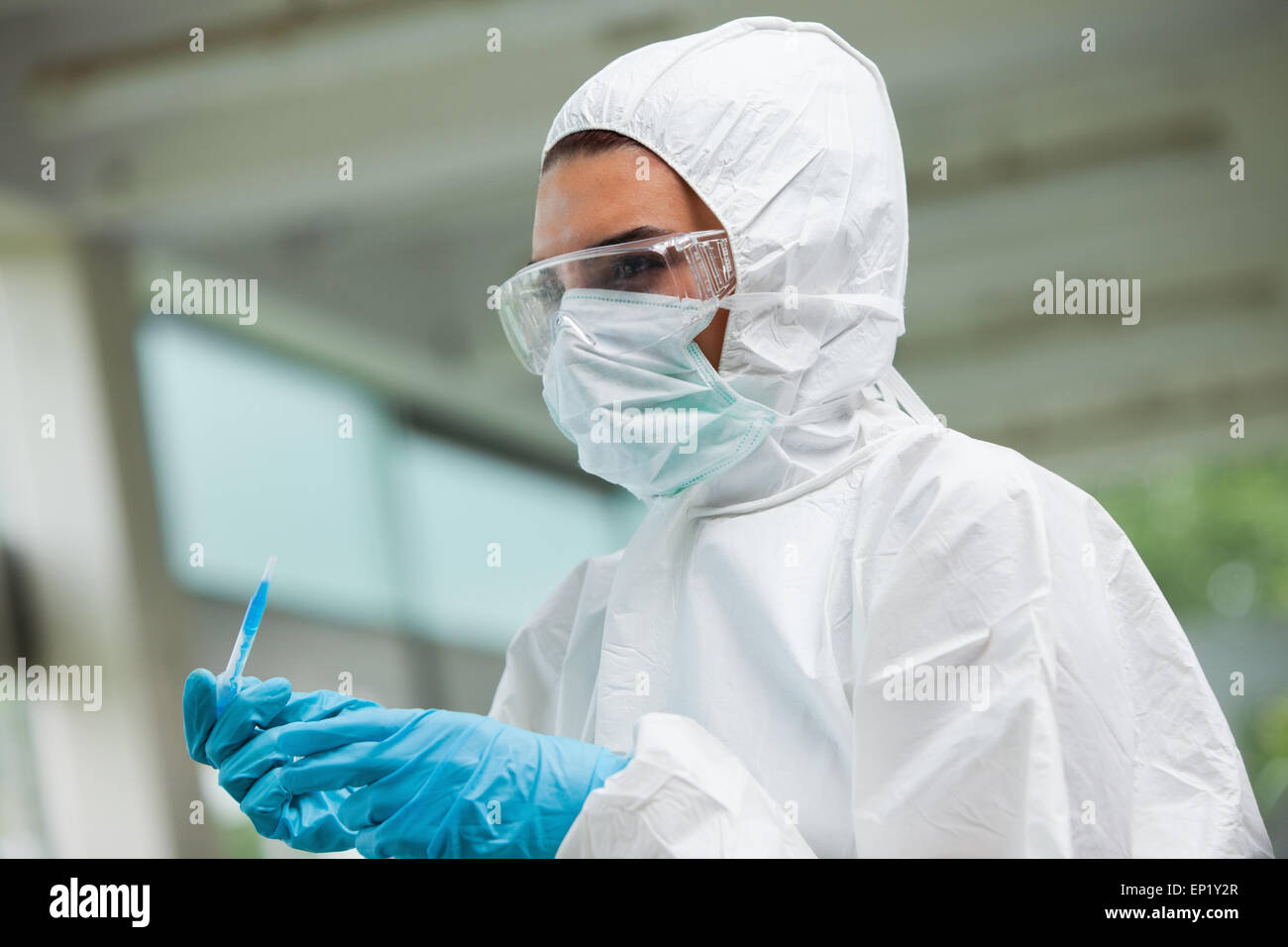 Protected science student posing with dangerous liquid Stock Photo - Alamy