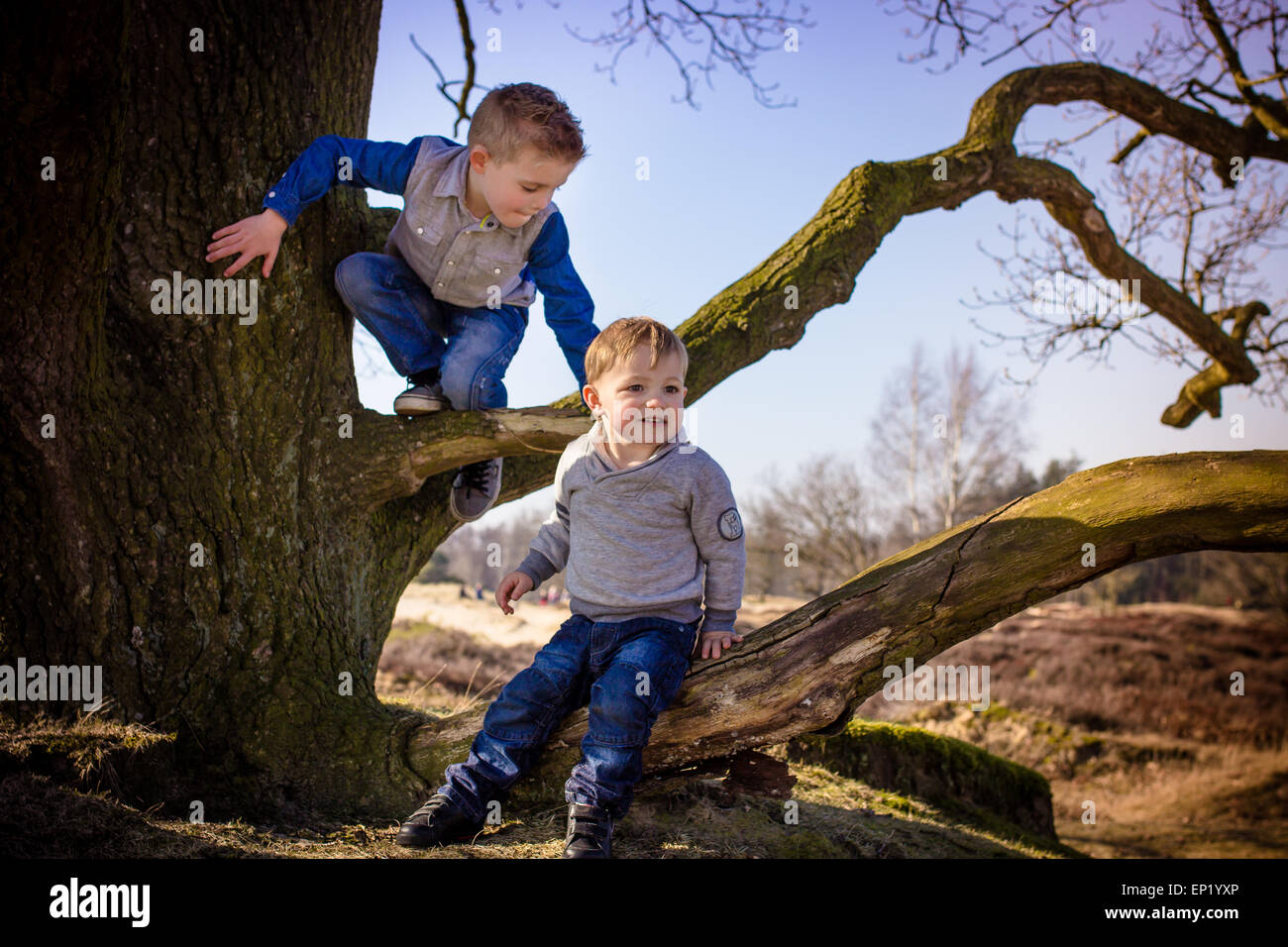 Two boys playing outside Stock Photo