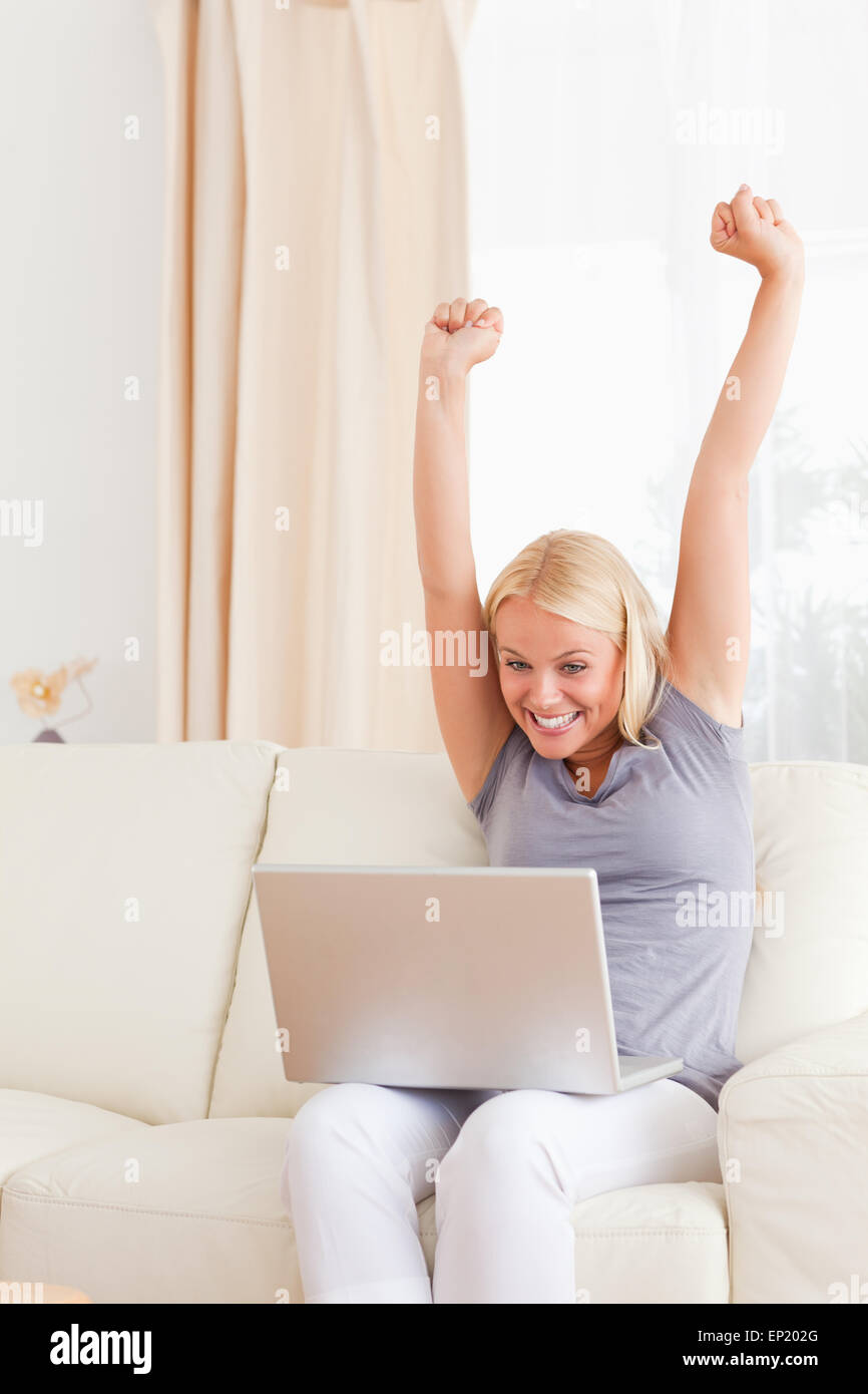 Portrait of a woman cheering up Stock Photo - Alamy