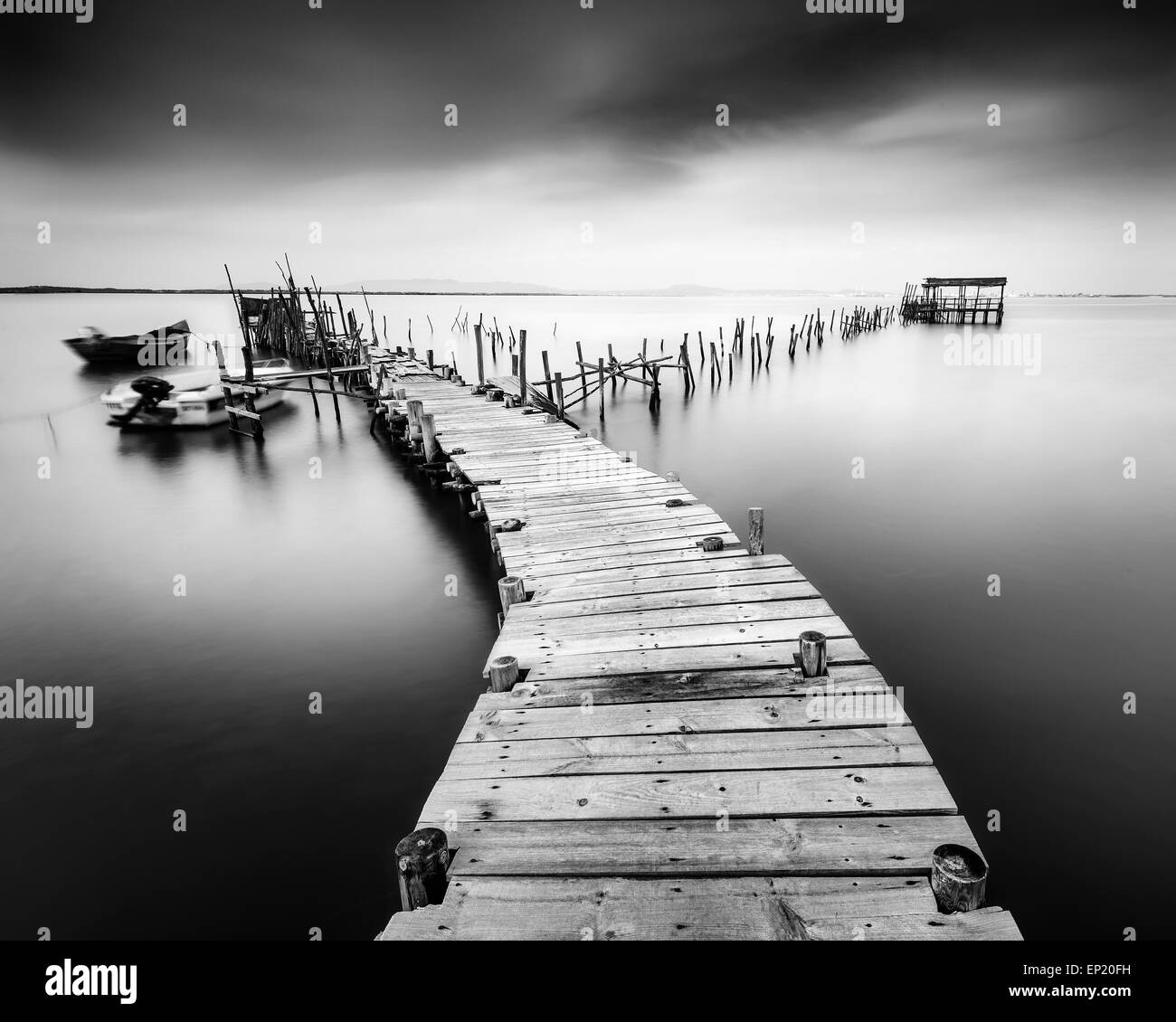 Dilapidated old pier in Carrasqueira, Portugal Stock Photo