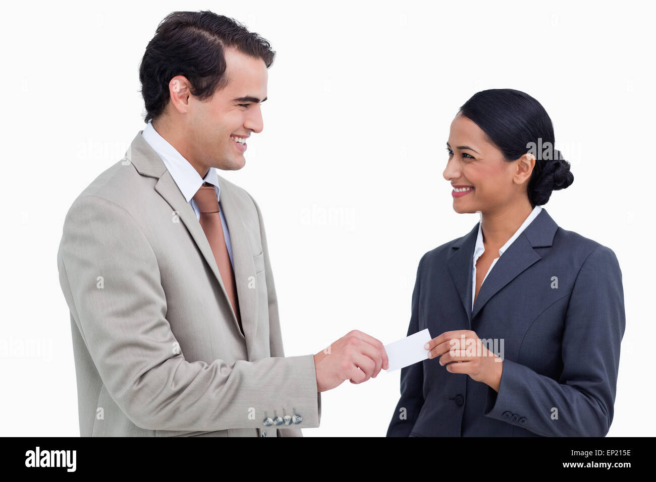 Smiling business people exchanging business cards Stock Photo Alamy