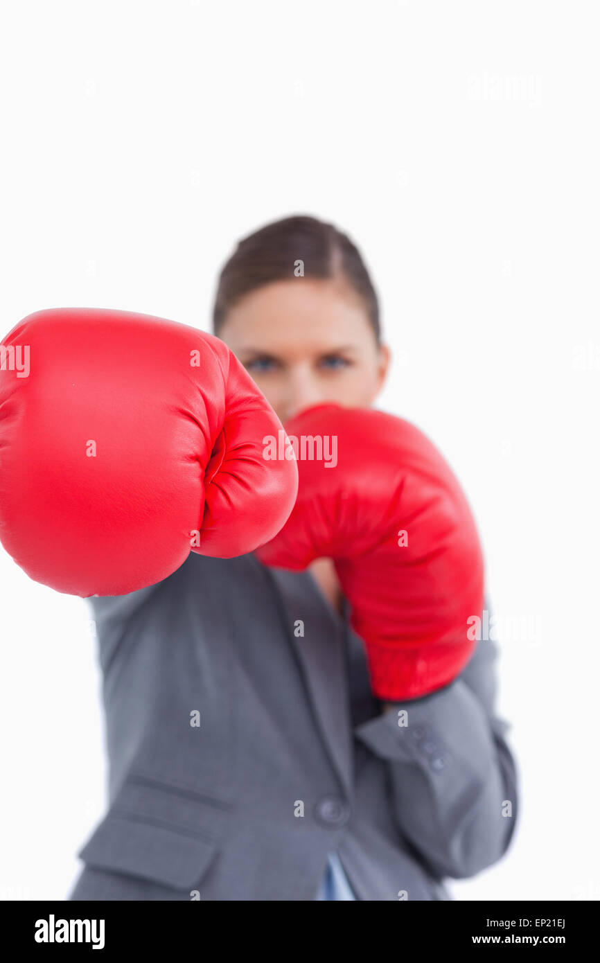 Attacking fist of tradeswoman in boxing glove Stock Photo Alamy