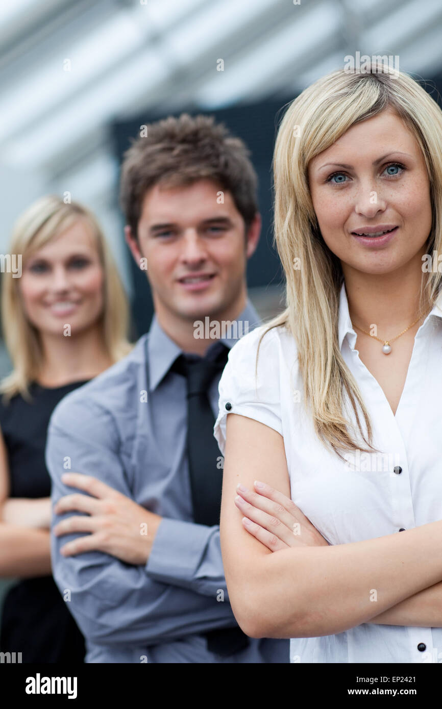 Portrait of a businesswoman in front of her team Stock Photo - Alamy