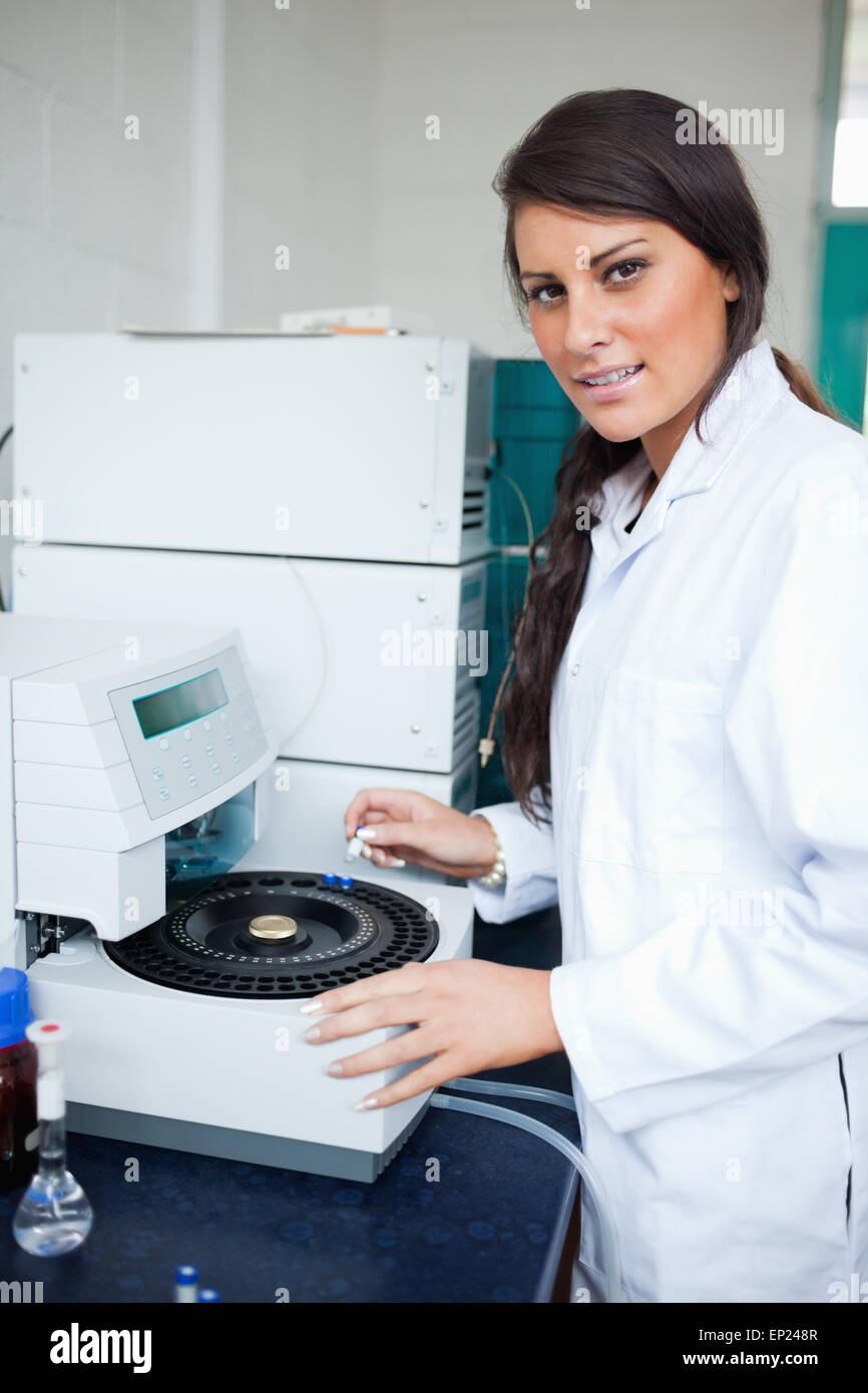 Serious scientist using a centrifuge Stock Photo Alamy