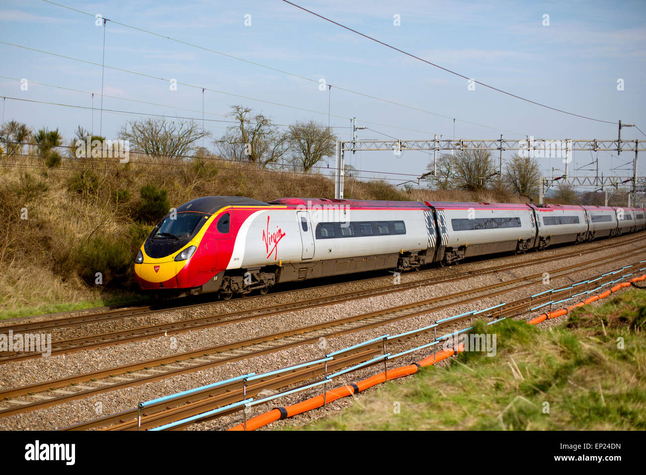 Virgin Rail high speed train in motion in UK Stock Photo