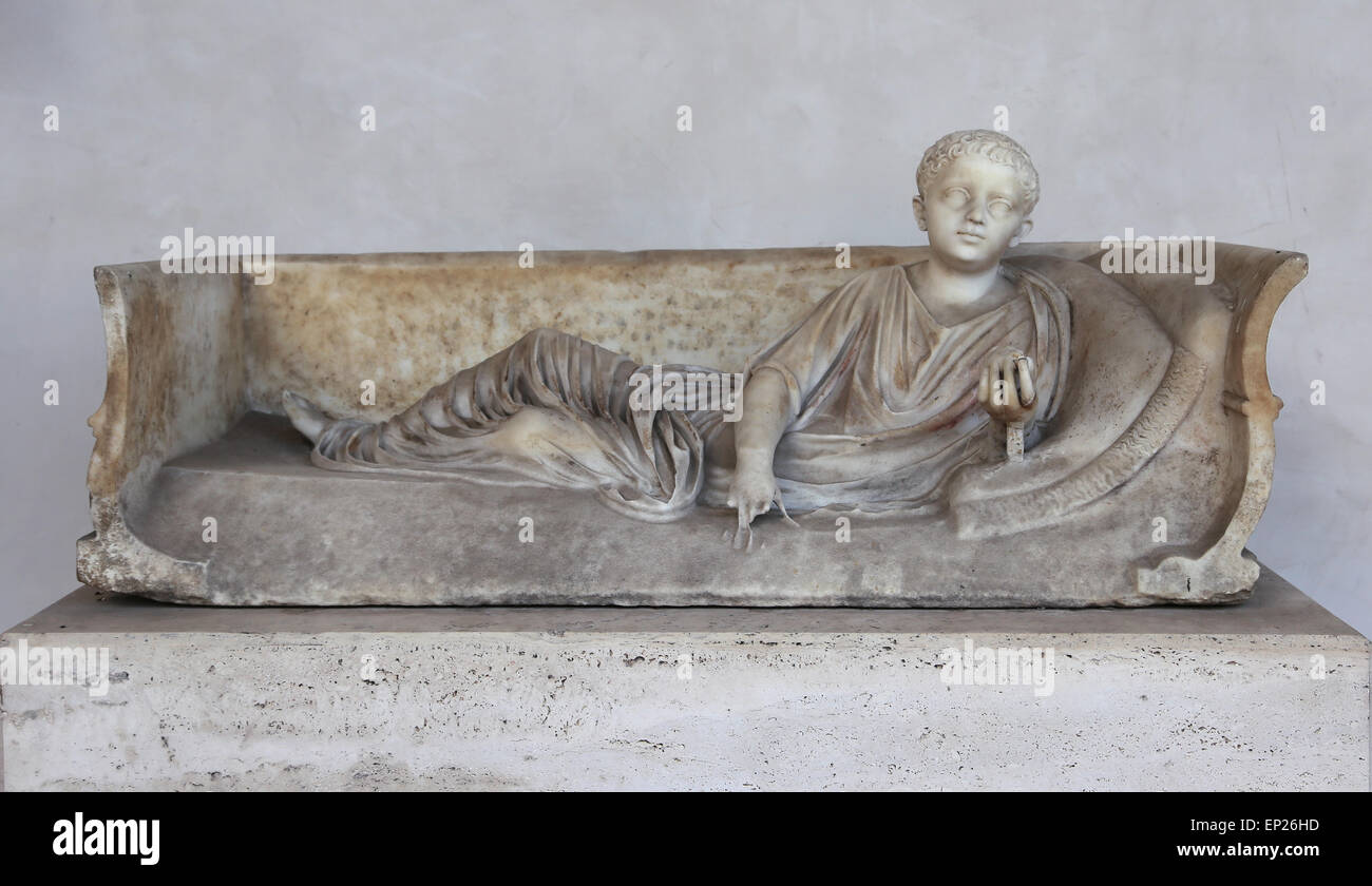Monument funerary. Roman. Deceased  holding. Boy. Marble. National Roman Museum. Baths of Diocletian. Rome. Italy. Stock Photo