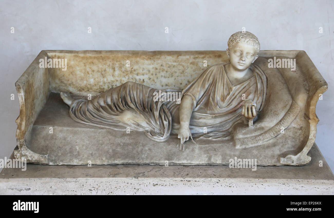 Monument funerary. Roman. Deceased  holding. Boy. Marble. National Roman Museum. Baths of Diocletian. Rome. Italy. Stock Photo