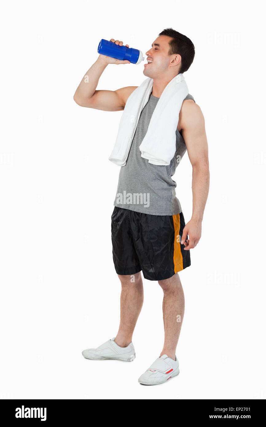 Young male drinking after workout Stock Photo Alamy