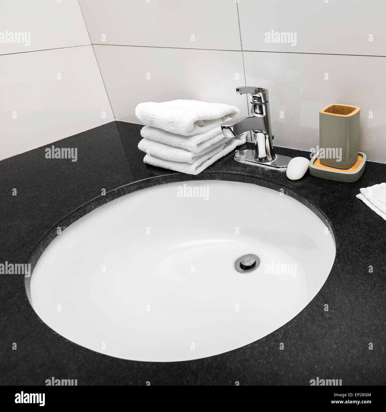 Bathroom sink at restroom hotel interior Stock Photo