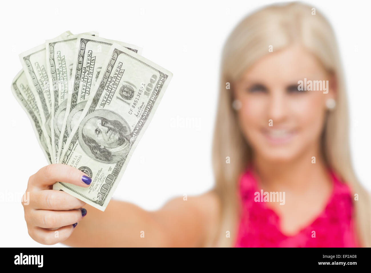 Beautiful blonde holding 100 dollars banknotes Stock Photo