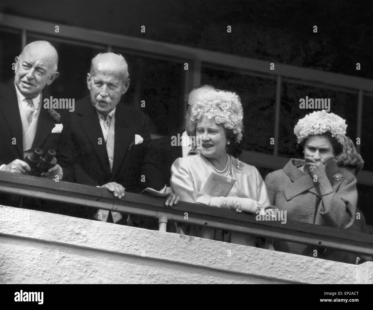 Her Majesty Queen Elizabeth II watches the horseracing from the Royal ...