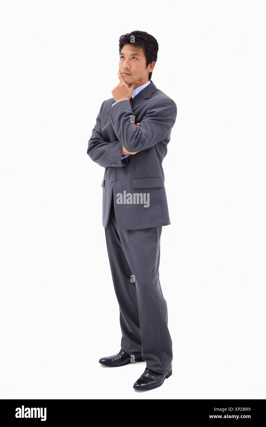 Portrait of a thoughtful businessman with the arms crossed Stock Photo ...