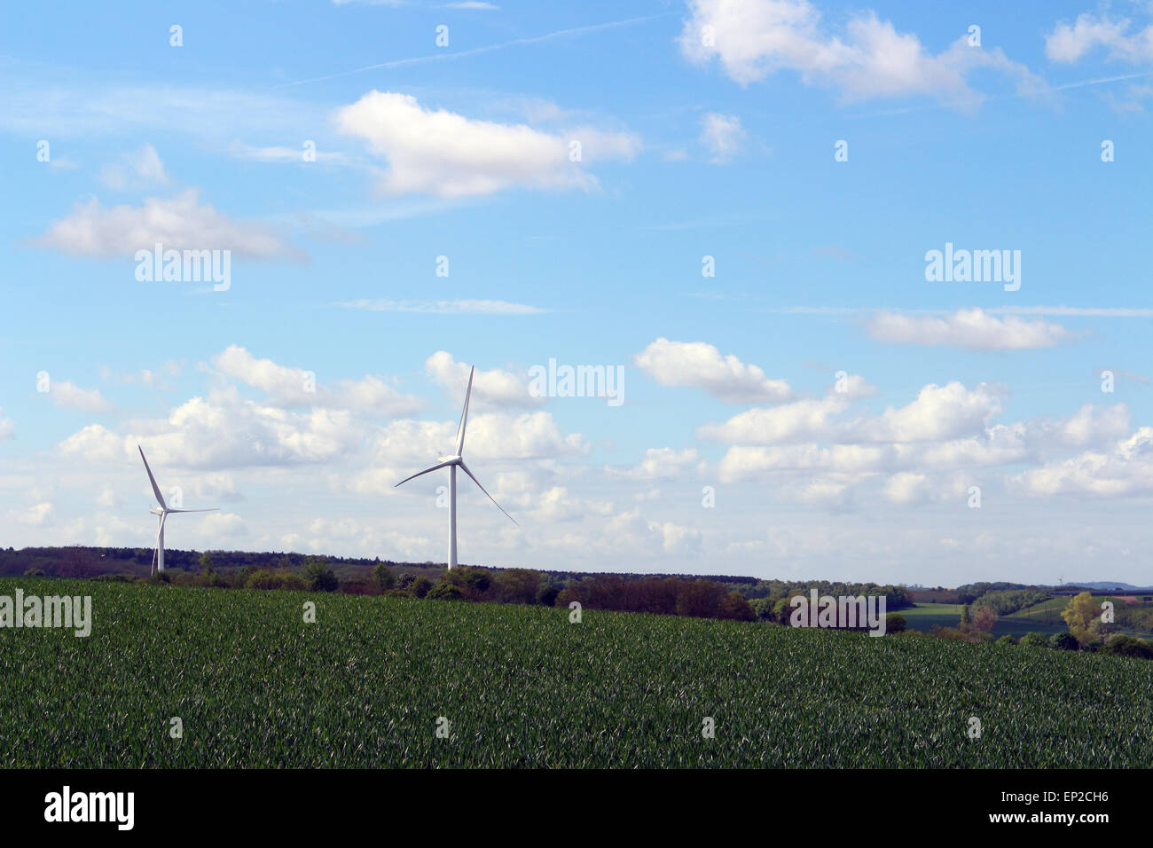 two wind turbines on rolling hillside bilsthorpe nottinghamshire england Stock Photo