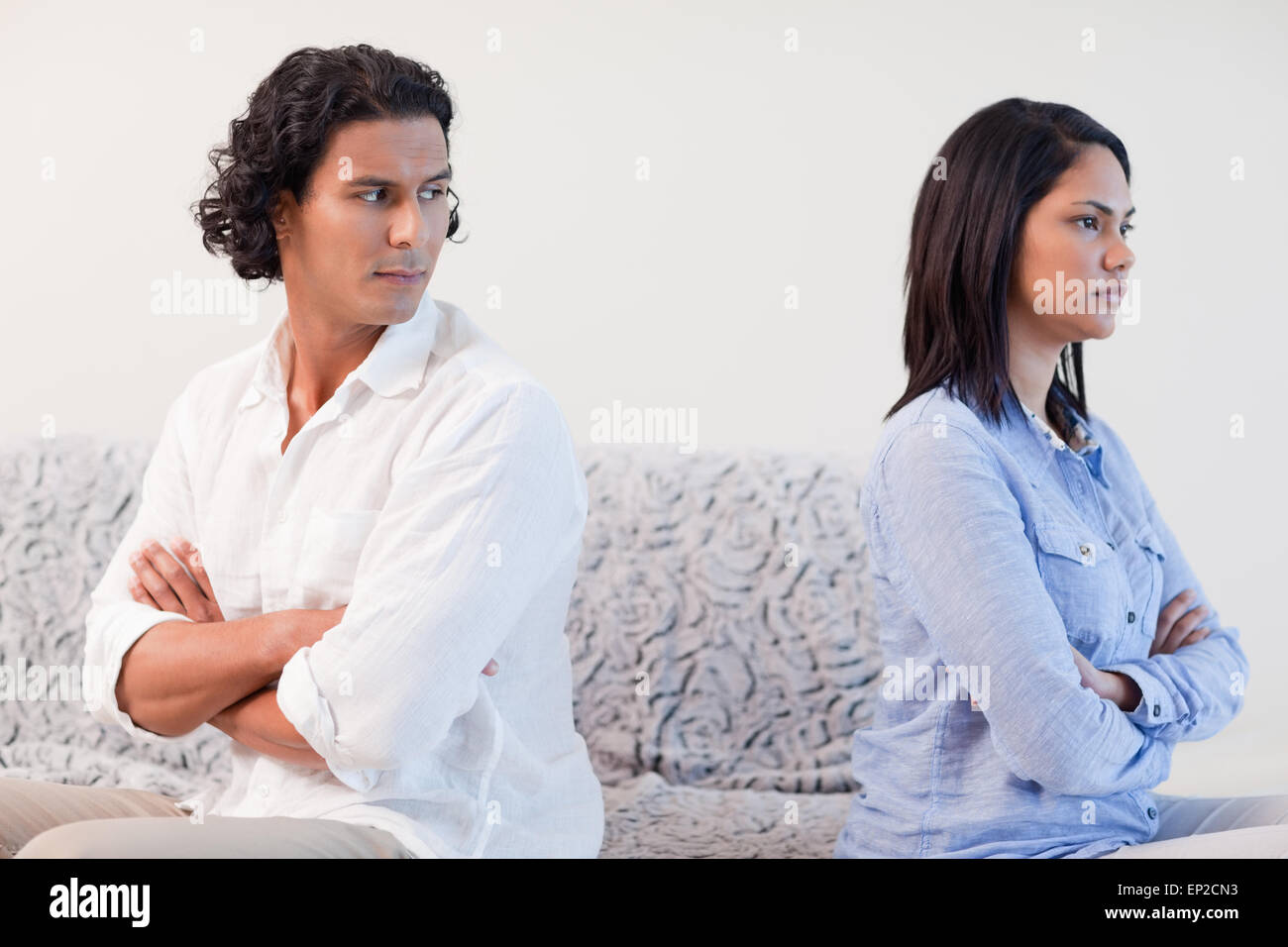 Couple having a fight in the living room Stock Photo - Alamy