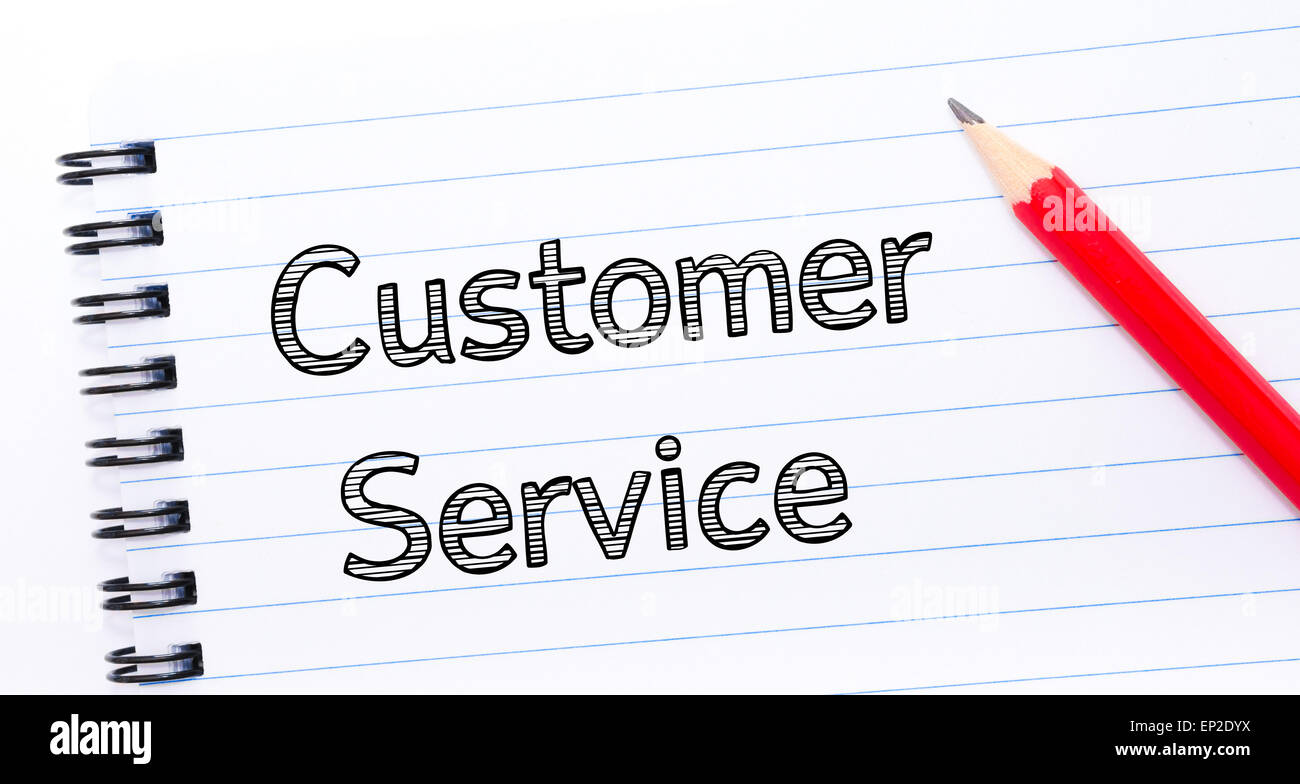 Customer Service Text written on notebook page, red pencil on the right ...