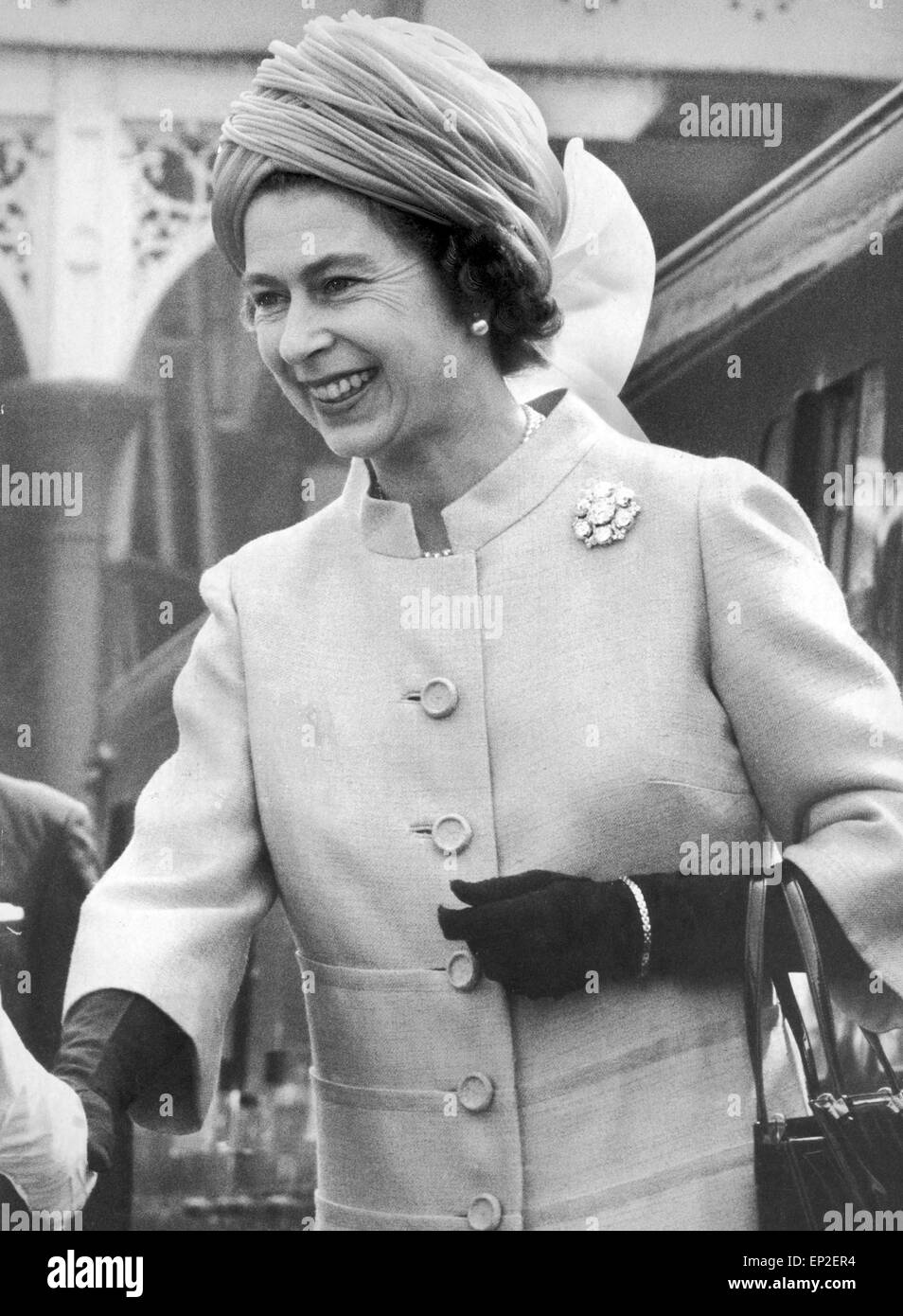 The Queen steps smiling from the Royal Train at Victoria Station, as she arrives in Manchester, 4th May 1972. Stock Photo