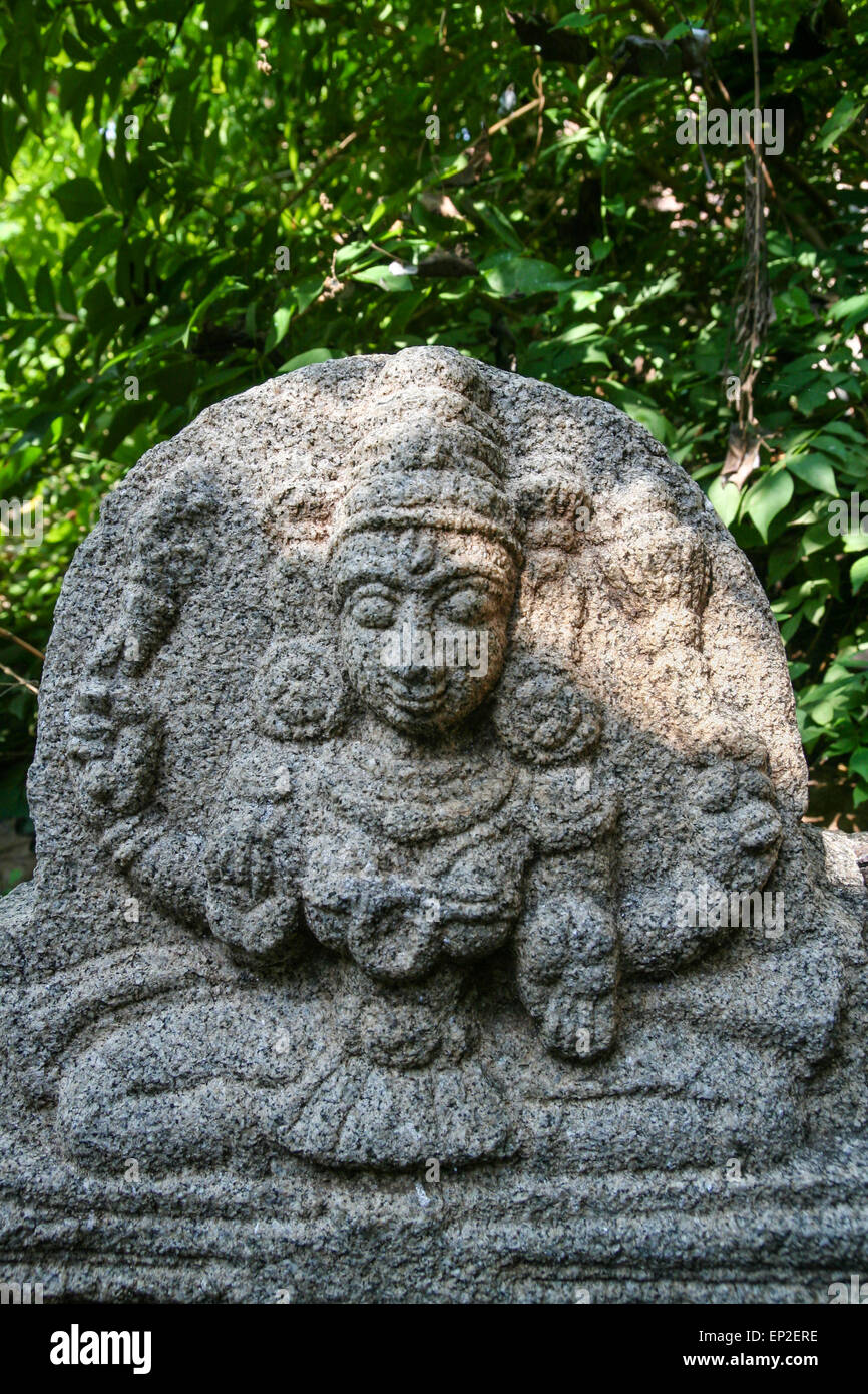 Vishnu stone statue at hampi ruins Stock Photo Alamy