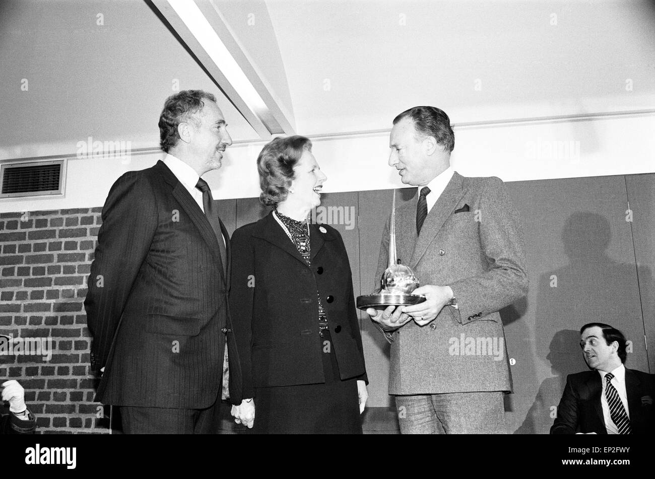Prime Minister Margaret Thatcher presents the National Vala Award of the 'National Viewers and Listeners Association' to the team of BBC TV Programme 'Yes Minister', pictured London, January 1984. Cast members on stage: Paul Eddington as MP Jim Hacker. Nigel Hawthorne as Sir Humphrey Appleby. Stock Photo