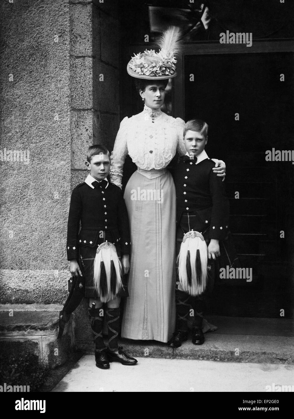 Portrait of Queen Mary with the Prince of Wales and Duke of York, later to become Edward VIII and King George VI. Stock Photo