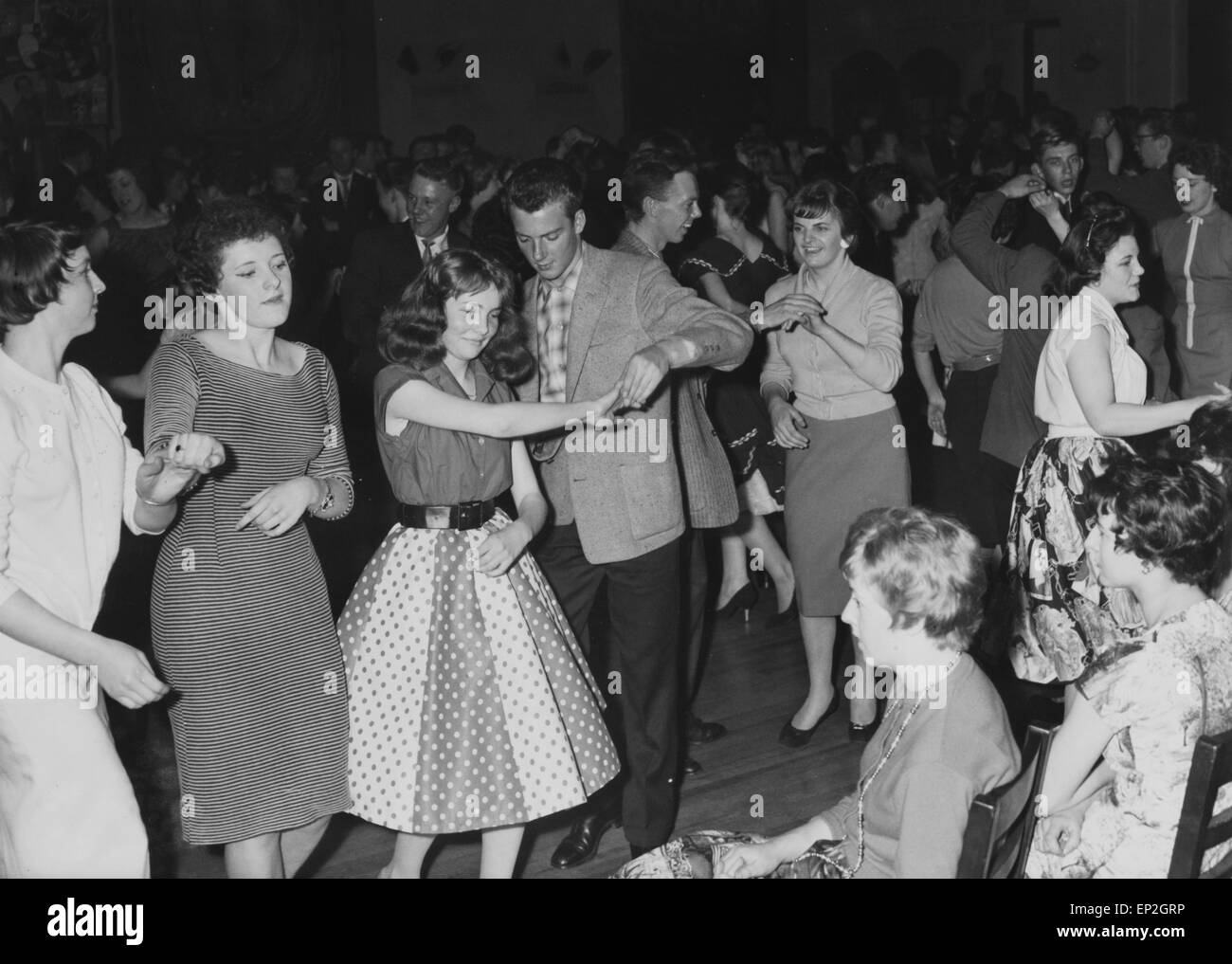 The Mardi Gras opened its doors to merseyside teenagers on 28 September 1957. The club's walls were decorated with Beat City murals by Liverpool artist Bob Percival. The club was used for location shots in a Rank feature film in 1964. The original Mardi Gras club was demolished in 1975 and hosted acts such as The Beatles, The Big Three, Gerry and the Pacemakers and Cilla Black.. Our Picture shows: The Twist at the Mardi Gras, Liverpool 10th May 1959 Stock Photo