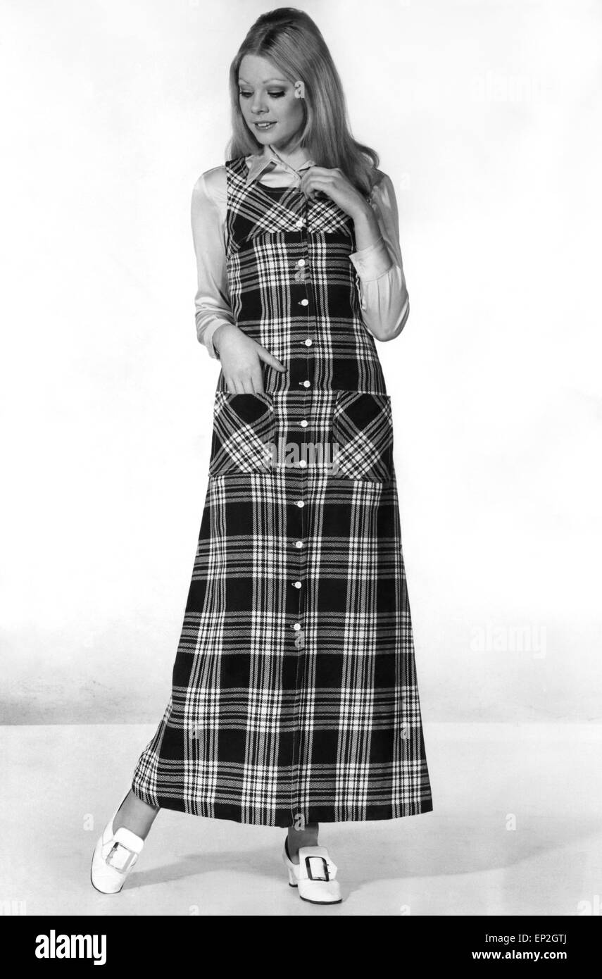 Clothing Fashion 1970: Cross Check Little girl look for a plaid pinafore.  The yoke has a curved-off square neck. Neat patch pockets are practical. In  green, brown, red or mouve, all over-cheked