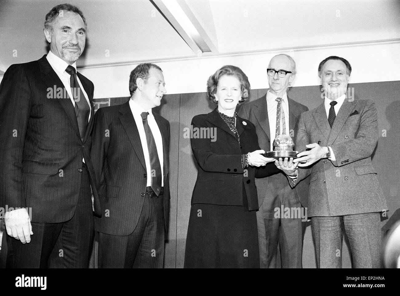 Prime Minister Margaret Thatcher presents the National Vala Award of the 'National Viewers and Listeners Association' to the team of BBC TV Programme 'Yes Minister', pictured London, January 1984. Cast members on stage: Paul Eddington as MP Jim Hacker. Nigel Hawthorne as Sir Humphrey Appleby. Stock Photo