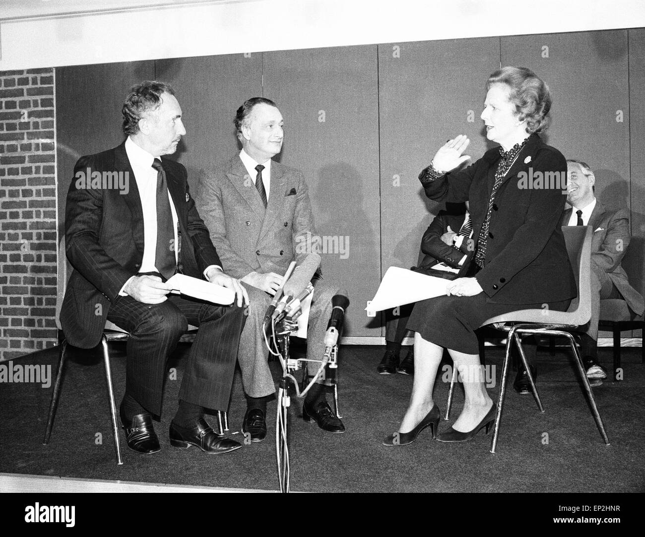 Prime Minister Margaret Thatcher presents the National Vala Award of the 'National Viewers and Listeners Association' to the team of BBC TV Programme 'Yes Minister', pictured London, January 1984. Cast members on stage: Paul Eddington as MP Jim Hacker. Nigel Hawthorne as Sir Humphrey Appleby. Stock Photo