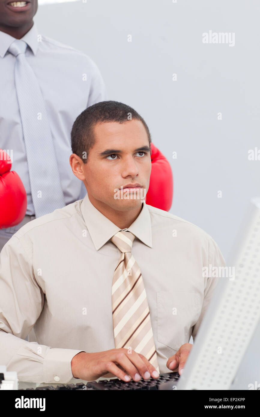 Boxing a businessman in the office Stock Photo Alamy