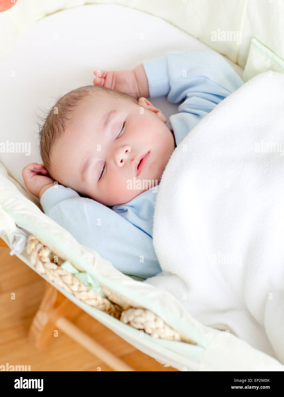 Adorable baby sleeping in his bed Stock Photo - Alamy